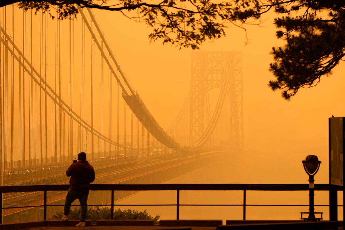 In pictures: Canadian wildfires impact US air quality